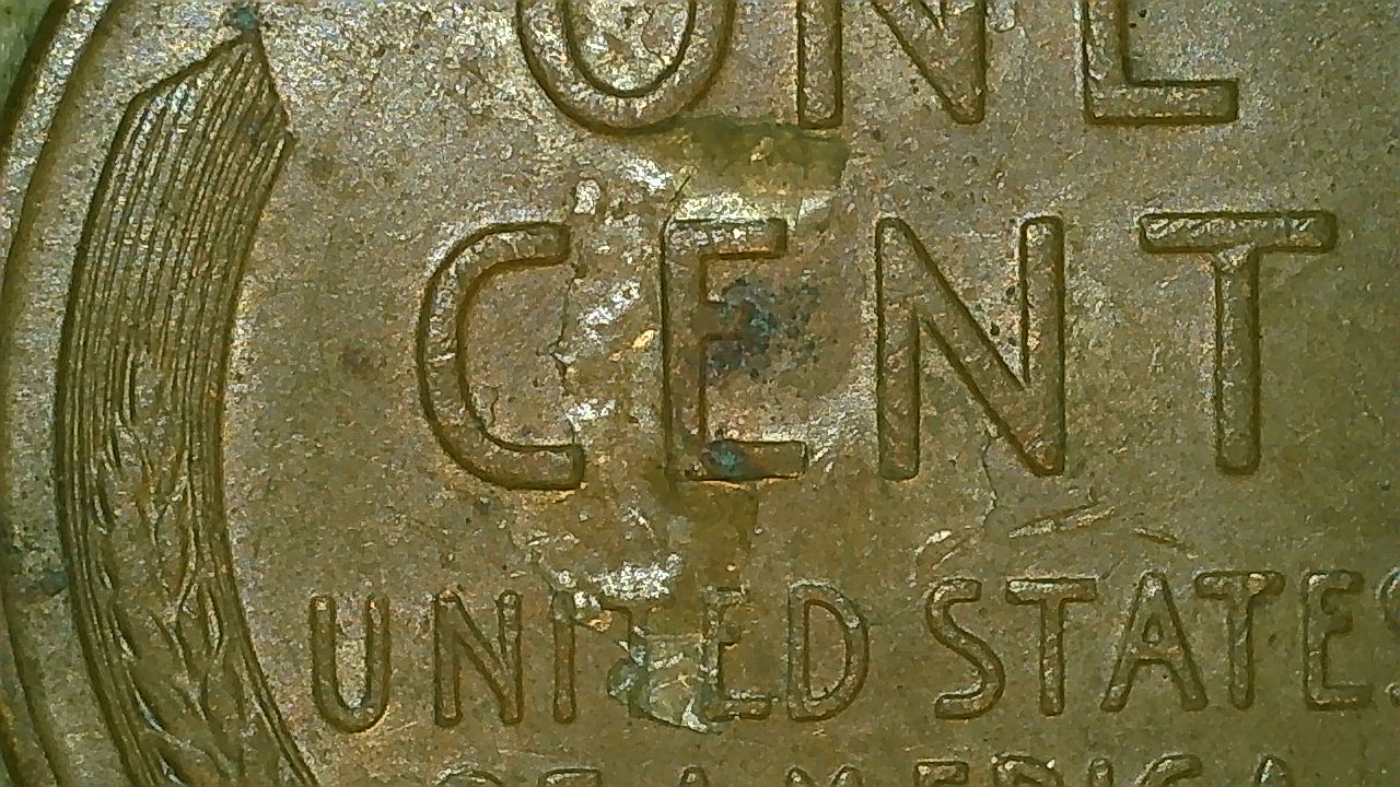 1958-Wheat-Penny-Foreign-Object-Mark?
